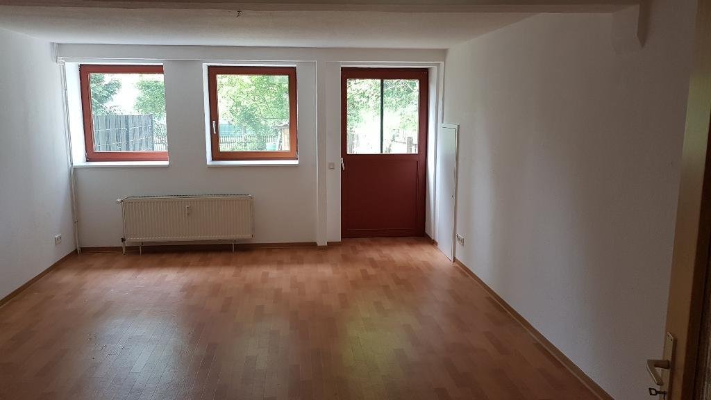 Wohnzimmer mit Tür zur Terrasse - Archivfoto - Eigentumswohnung in Schöppenstedt-Schliestedt *LichtWelt-Immo Immobilienvermittlung